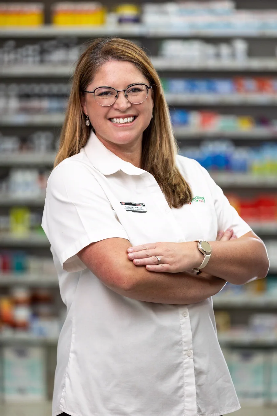 Karlien Venter, the responsible pharmacist at Albertyn Pharmacy, in front of the dispensary shelves